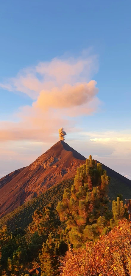 the tower at the top of a tall mountain