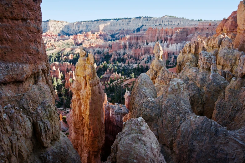 the rocky landscape is filled with towering rock formations