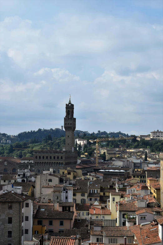 an old fashioned clock tower in a city