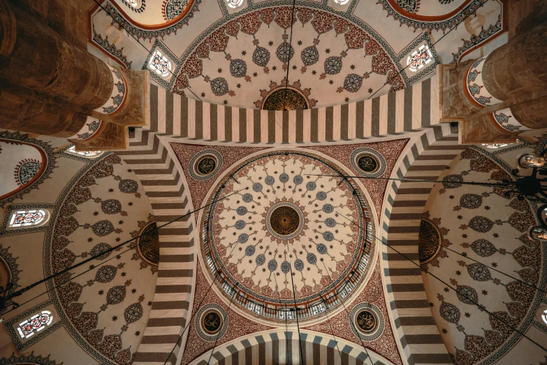 the ceiling of an old building has decorative design on it