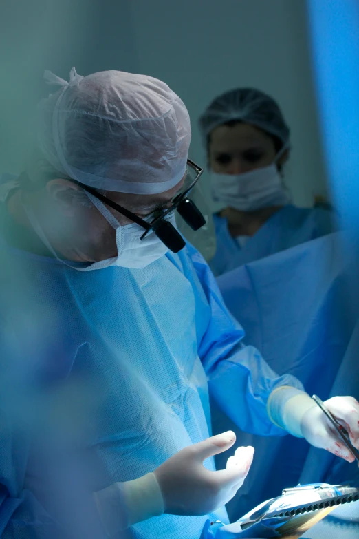 a group of doctors preparing for  with an open hand