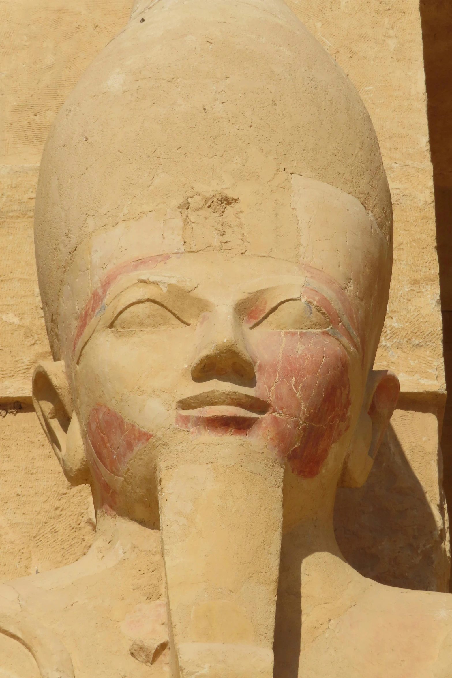 an unfinished statue of an ancient egyptian man is pictured