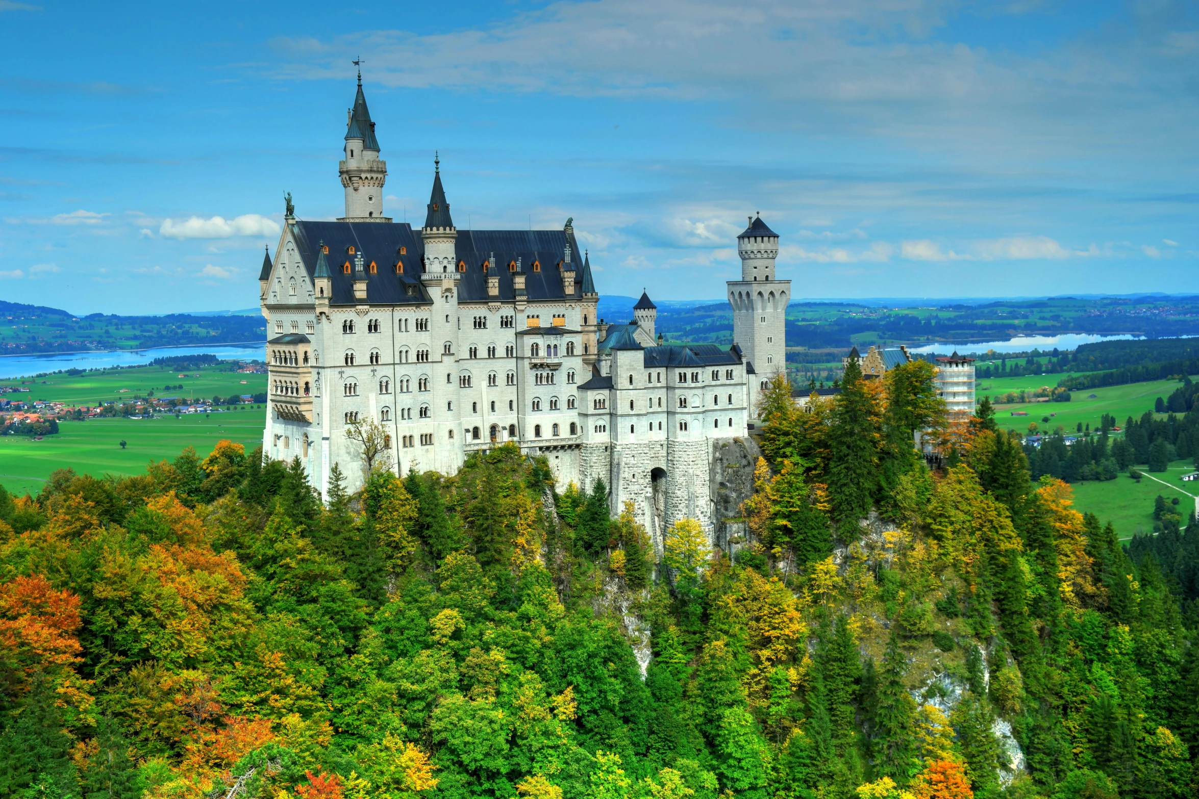 the view of an old castle on a hill