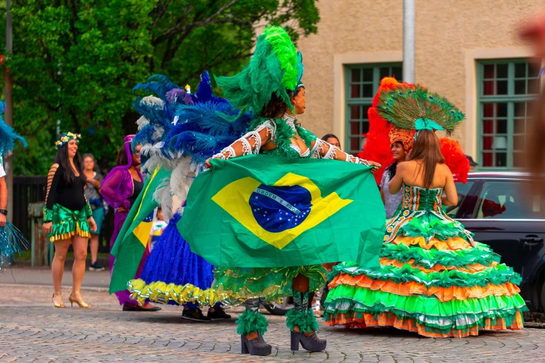 some very pretty ladies in colorful costumes