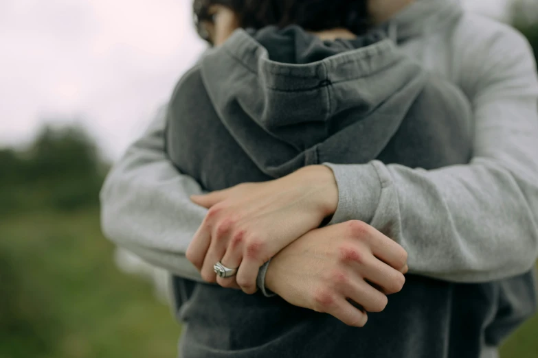 a close up of a person holding soing