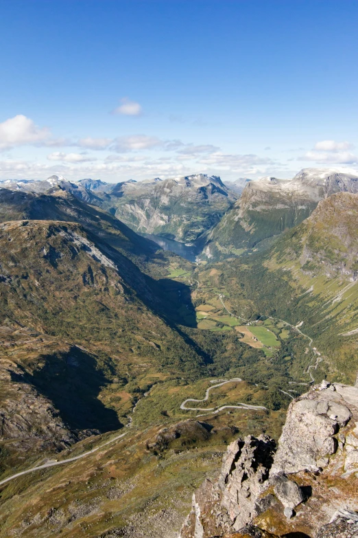 some mountains with a river going through them