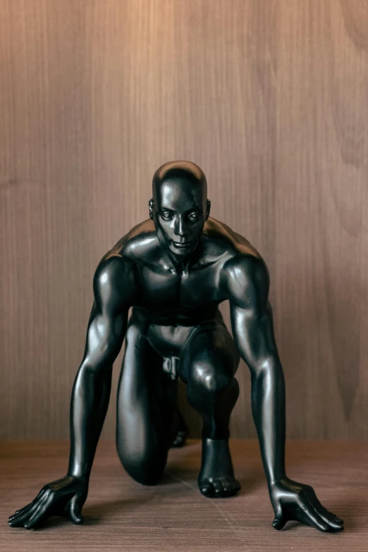 this is an image of a black man crouching