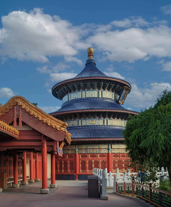 there is a large pagoda located in front of a building