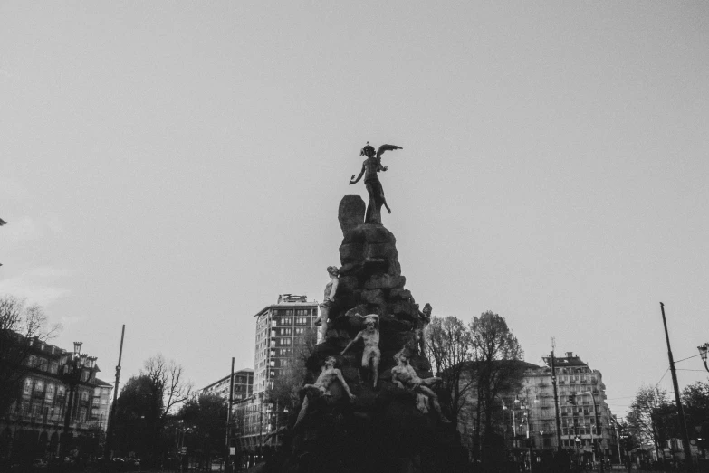 the statue is on top of the large statue