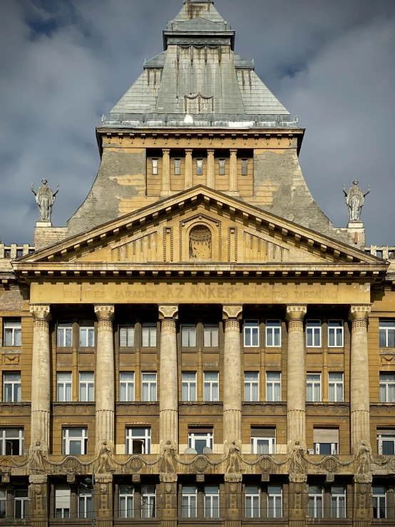 a building with several large pillars on top