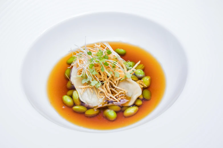 a bowl with food on a white plate