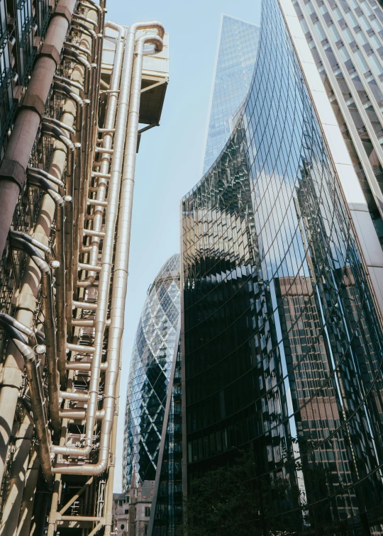 there are many tall buildings with metal railings around them