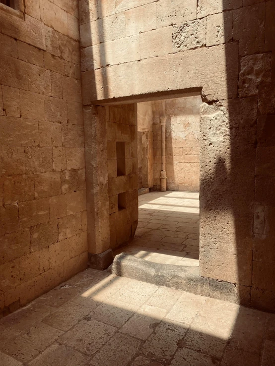 inside of an ancient building with many steps