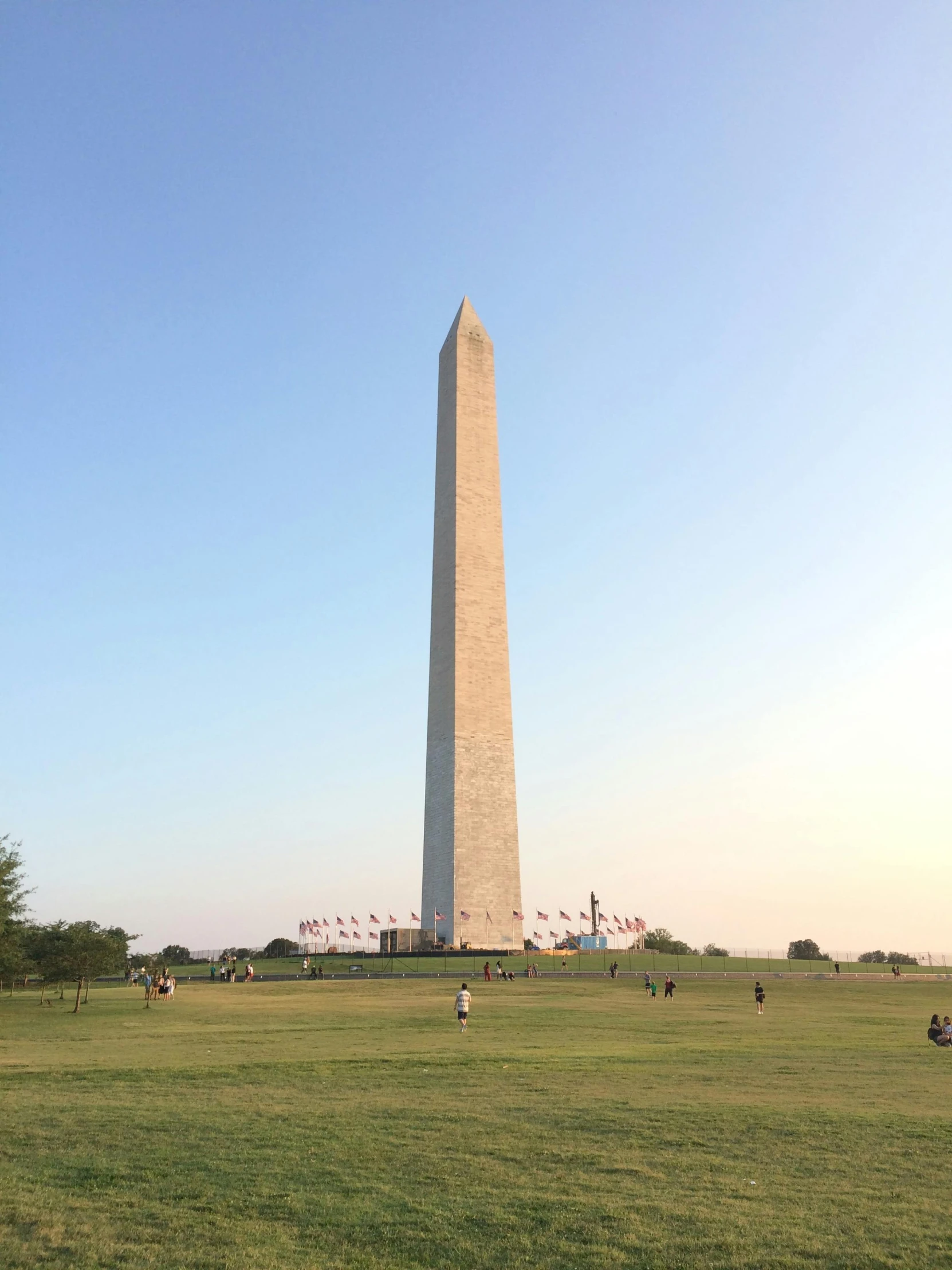 a very tall tower with a massive clock in the middle of it