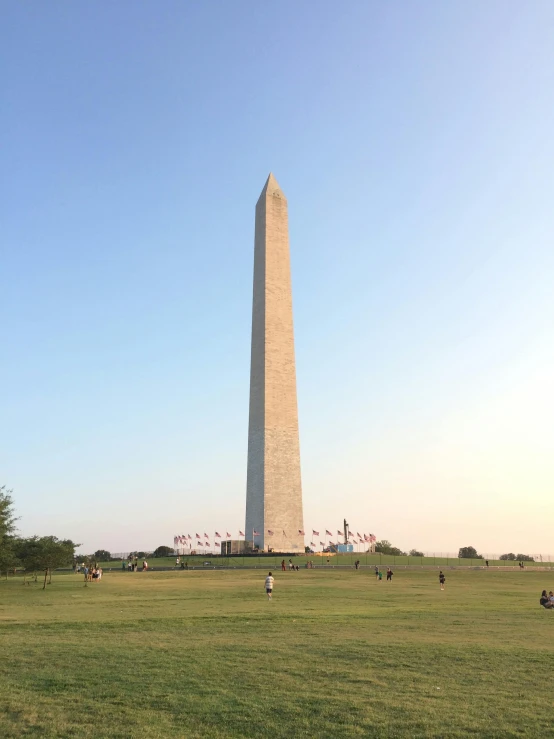 a very tall tower with a massive clock in the middle of it