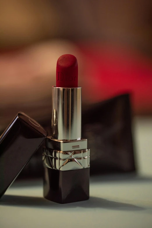 closeup of a red lipstick with an edge on it