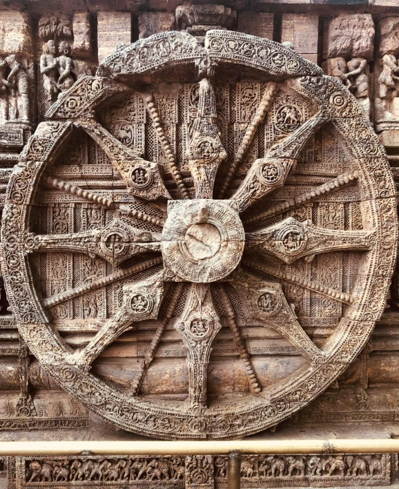 the wheel of hamtrada being driven on chariot wheel at an ancient indian temple