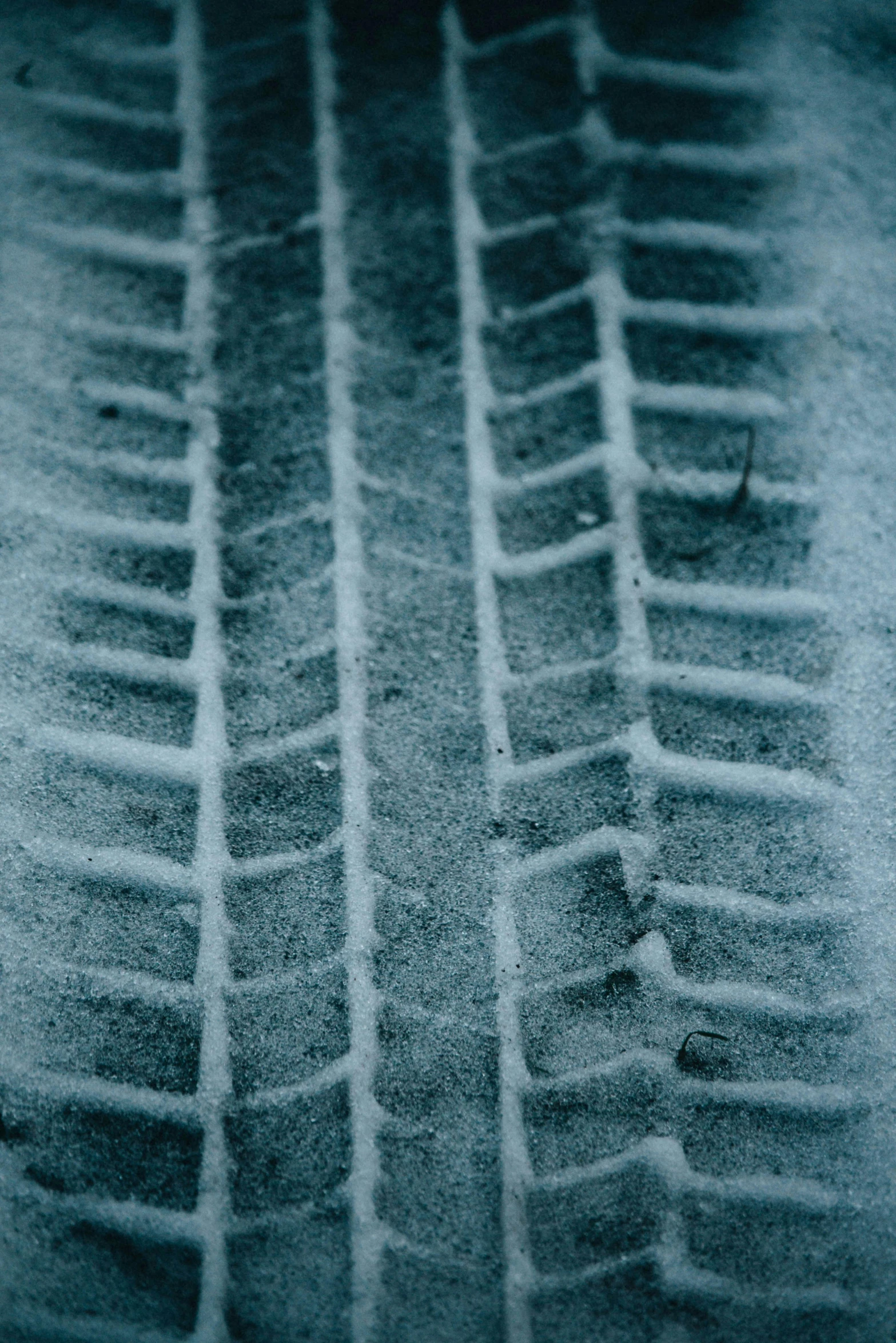 tire marks that are snow covered on them