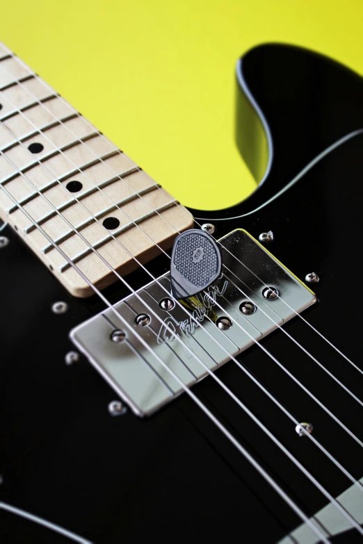 a close up of a guitar neck