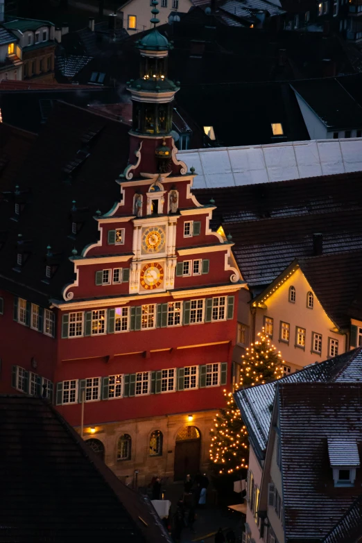 clock tower and town at night with lights