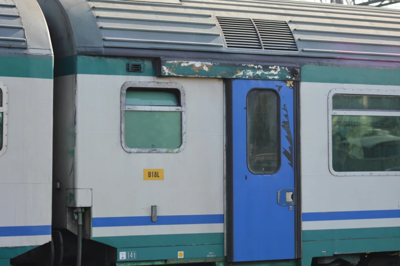 the door of an empty train near the platform