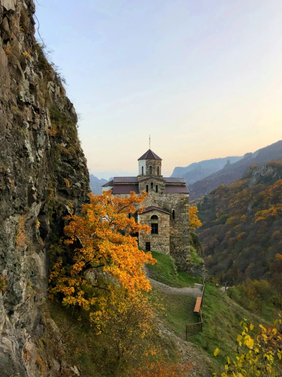 a scenic picture of a beautiful castle in the mountains