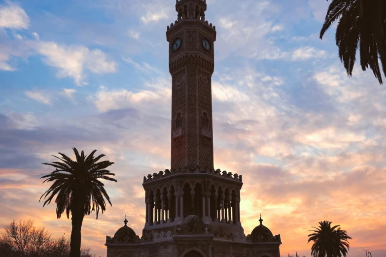 a large building has a clock on the tower