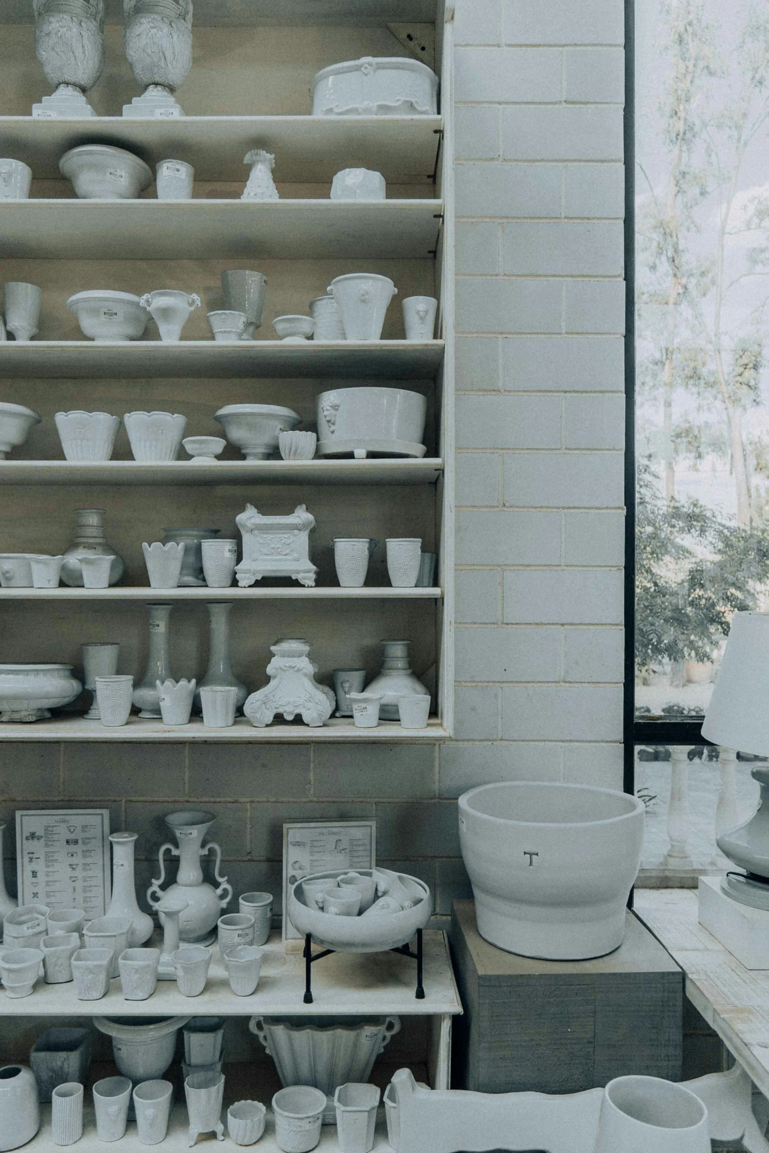 a table with pots, bowls and other items