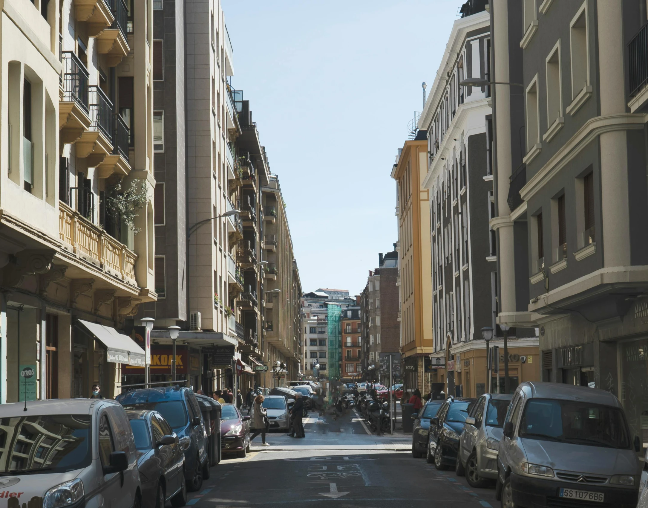 an image of street in the middle of town