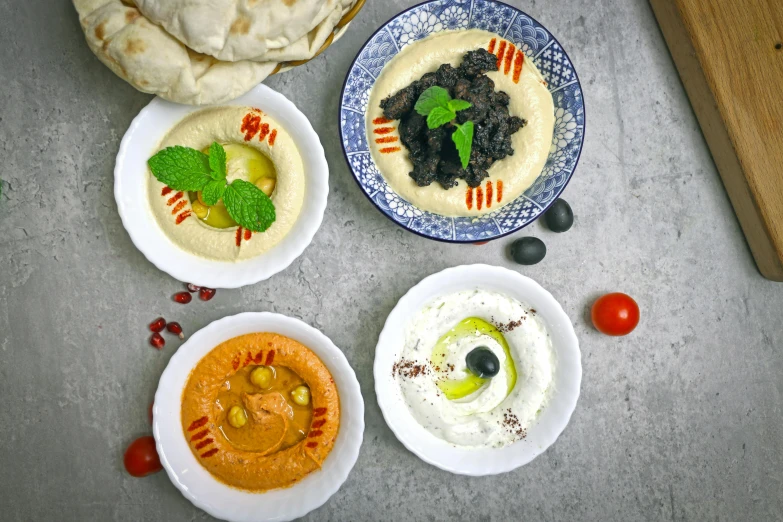 a variety of foods sitting on top of a table