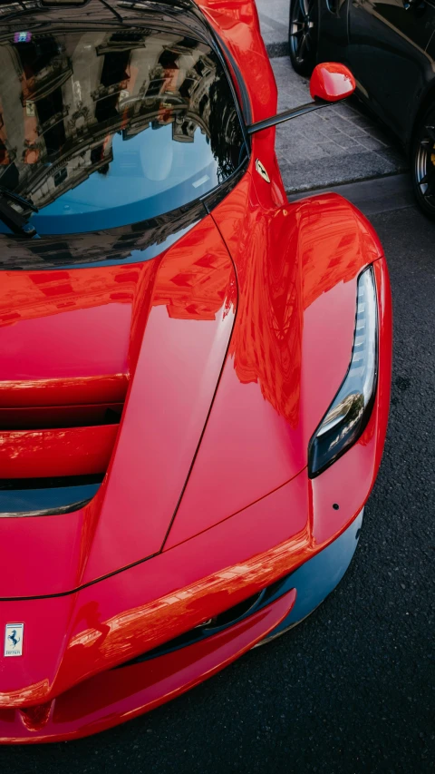 a close up view of the hood of a sports car