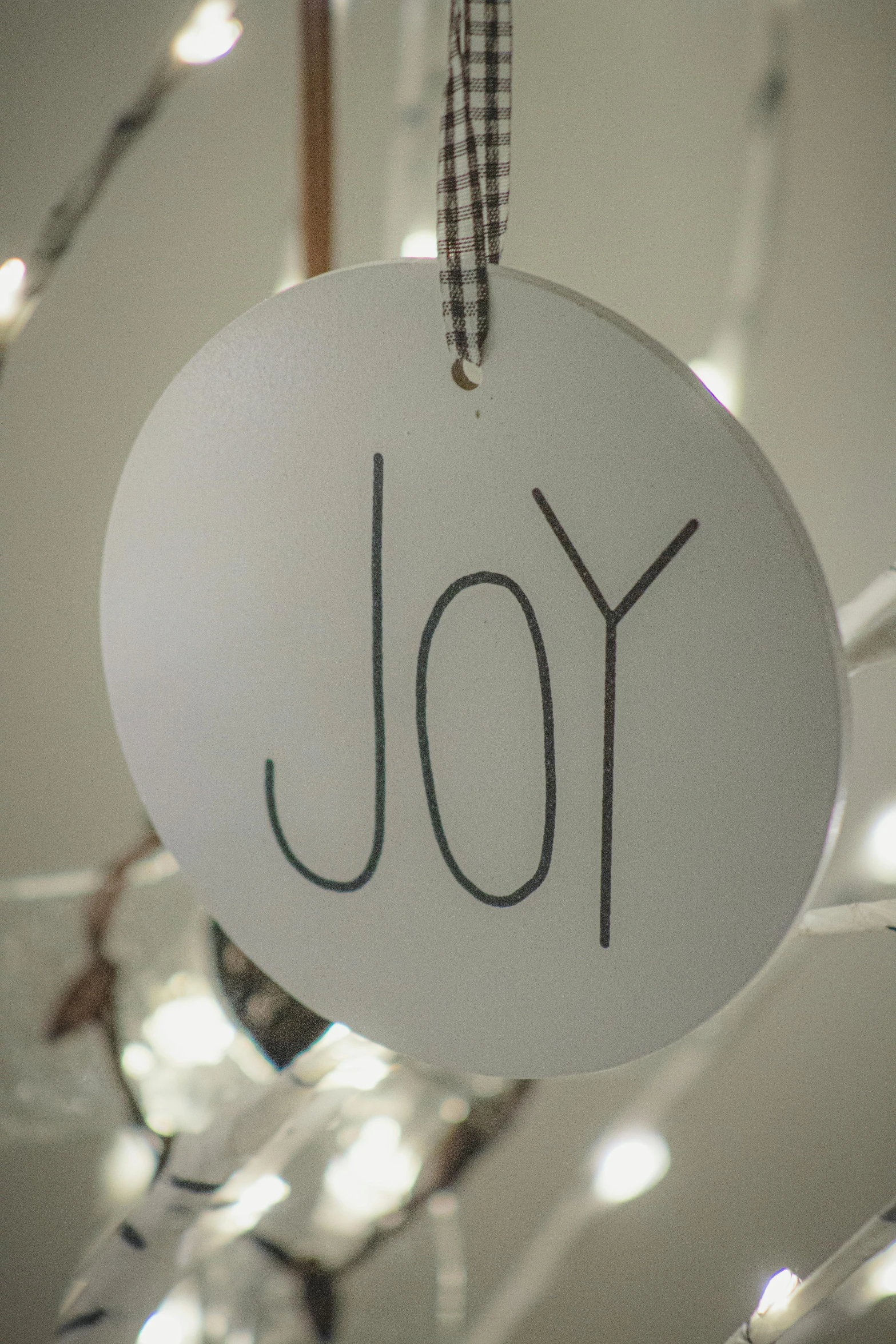 you written on a round hanging ornament