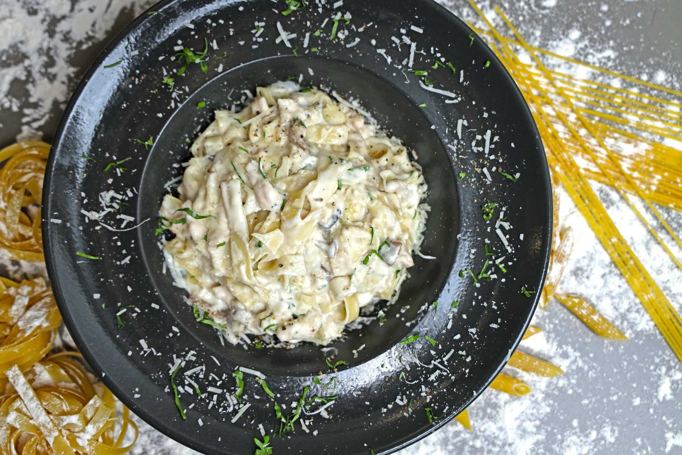 the pasta dish is being served on the plate