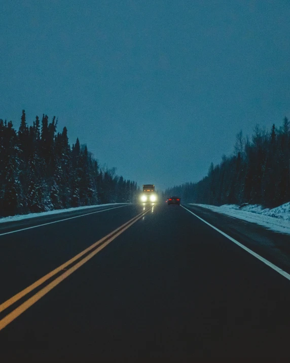 car at high speeds in winter on road