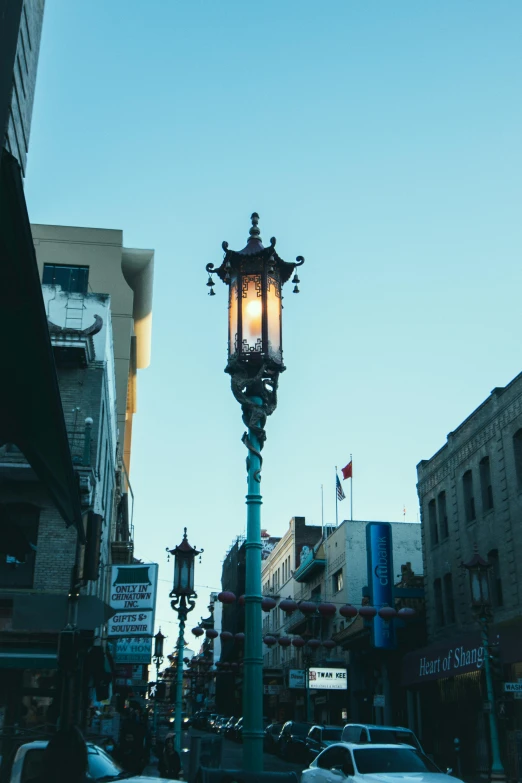 a light pole with a lamp on top of it