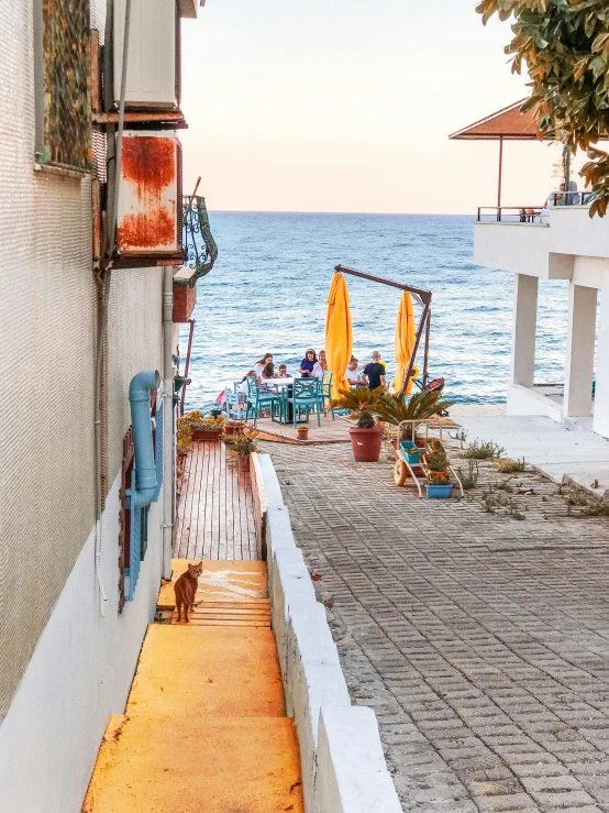 a view from an alley leading to the beach