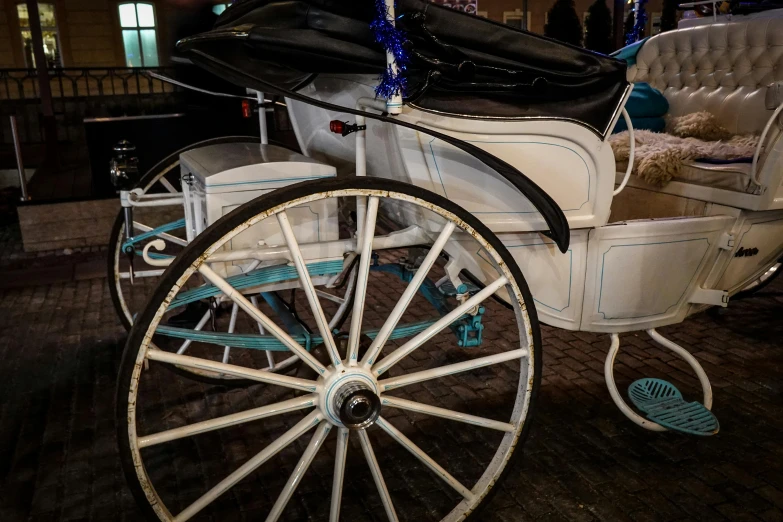 a large white horse is pulling a carriage