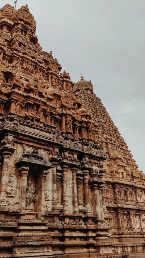 a tall temple like building that looks to be made of clay