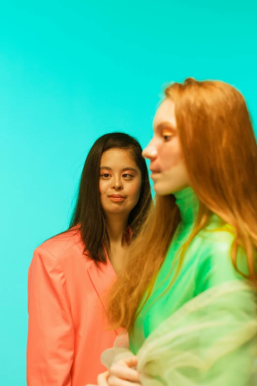 two young women standing next to each other