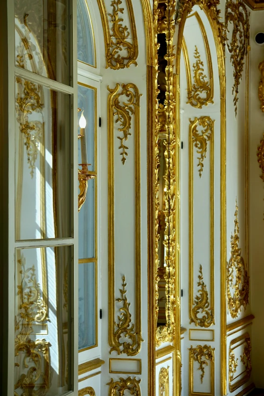 a room with several gold decorations in it