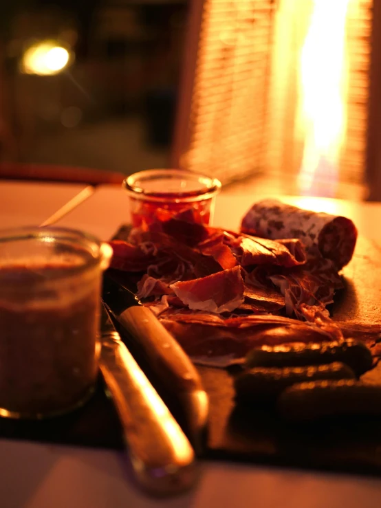 some sort of food on a wooden  board