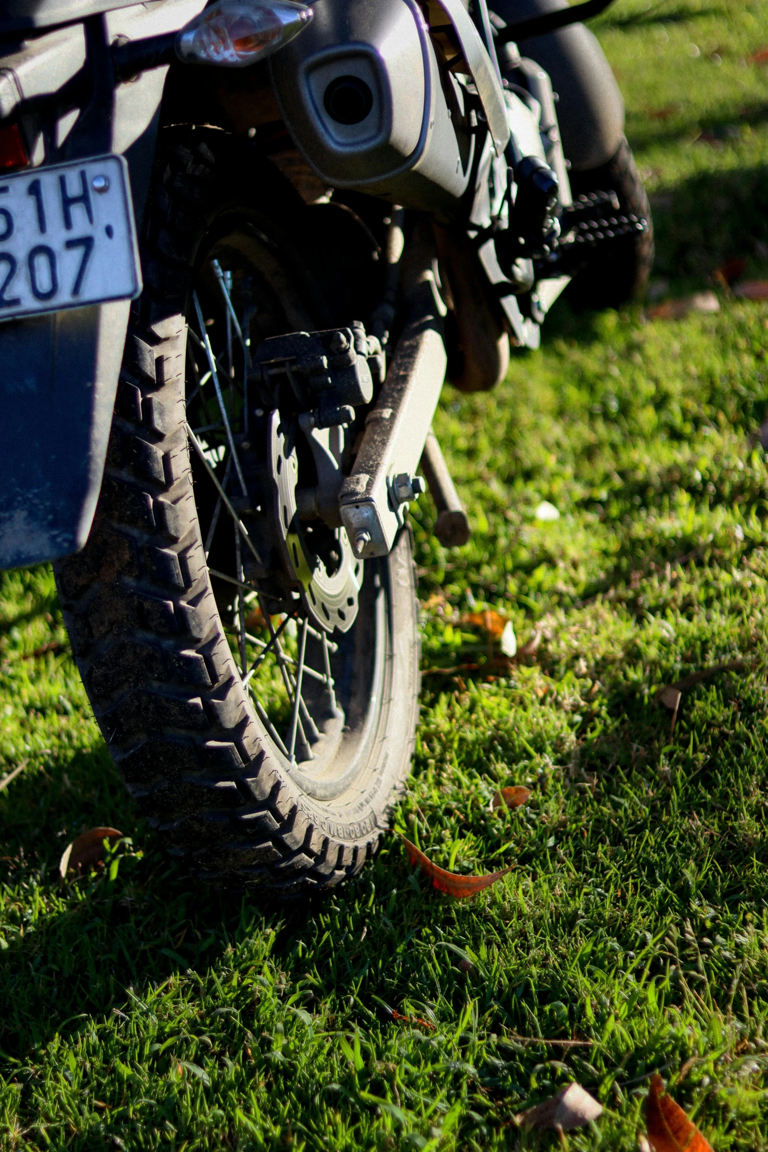 there is a bike that is on the grass