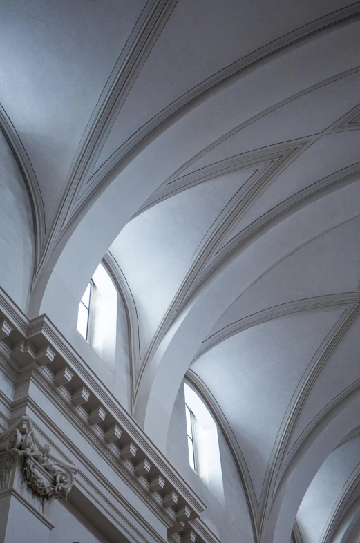 inside of a large cathedral with vaulted ceilings