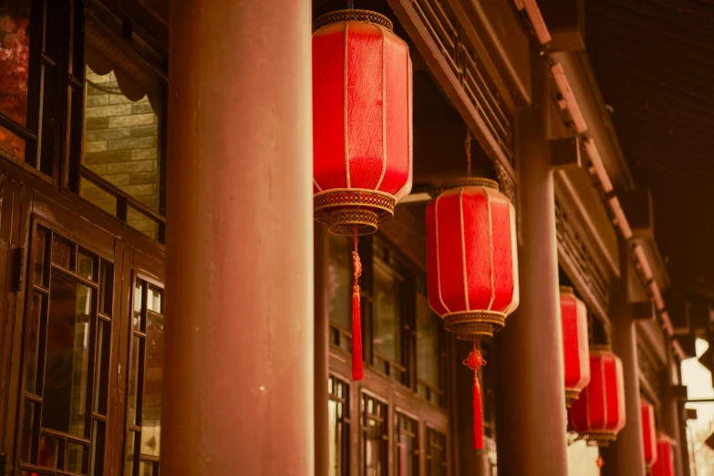 four red lantern with white and red decorations