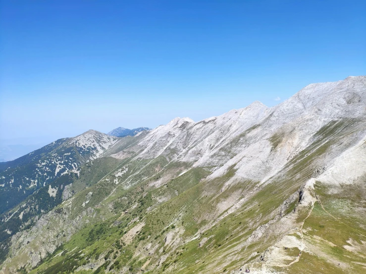 some mountain with some small patches of snow