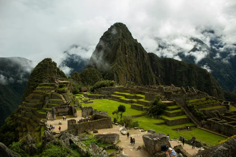 the ruins and staircases are dotted with mist in the distance