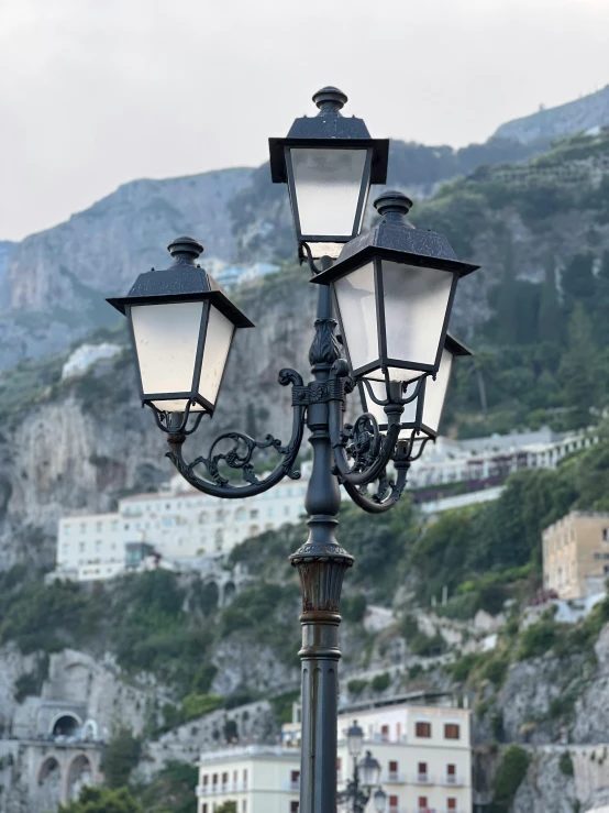 the lights are hanging from the street post