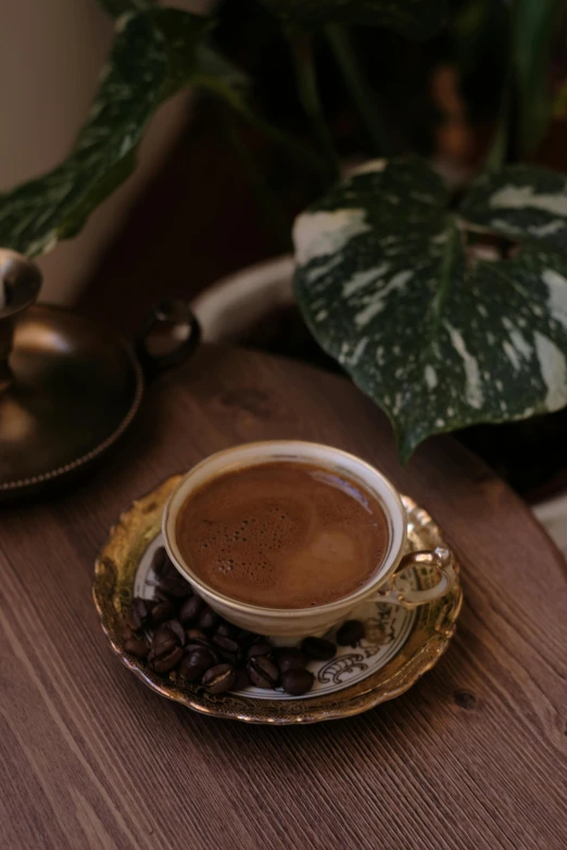 a plate that has a cup of coffee on it