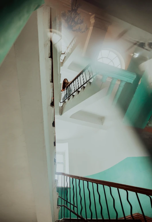 a building with a man walking up some stairs