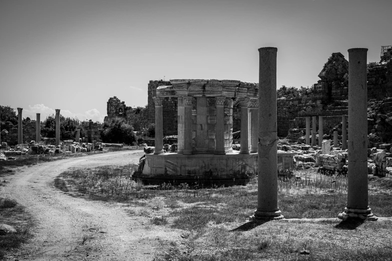 an old cemetery with two columns in the middle